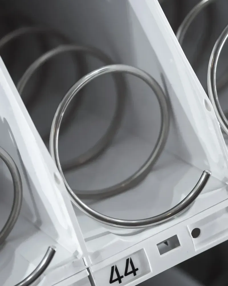 Close-up of the empty coils inside a vending machine