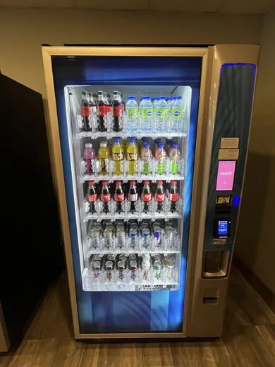 Restocking bottled drinks in a beverage machine